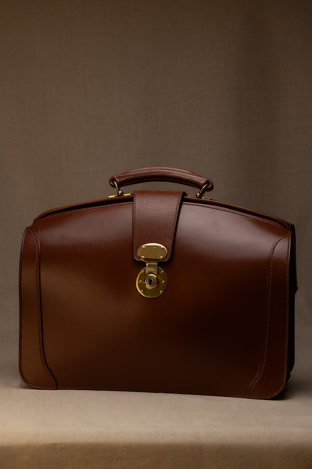 Elevate Your Style with the Bowtop Briefcase - Where Function Meets Fashion - Rutherfords
